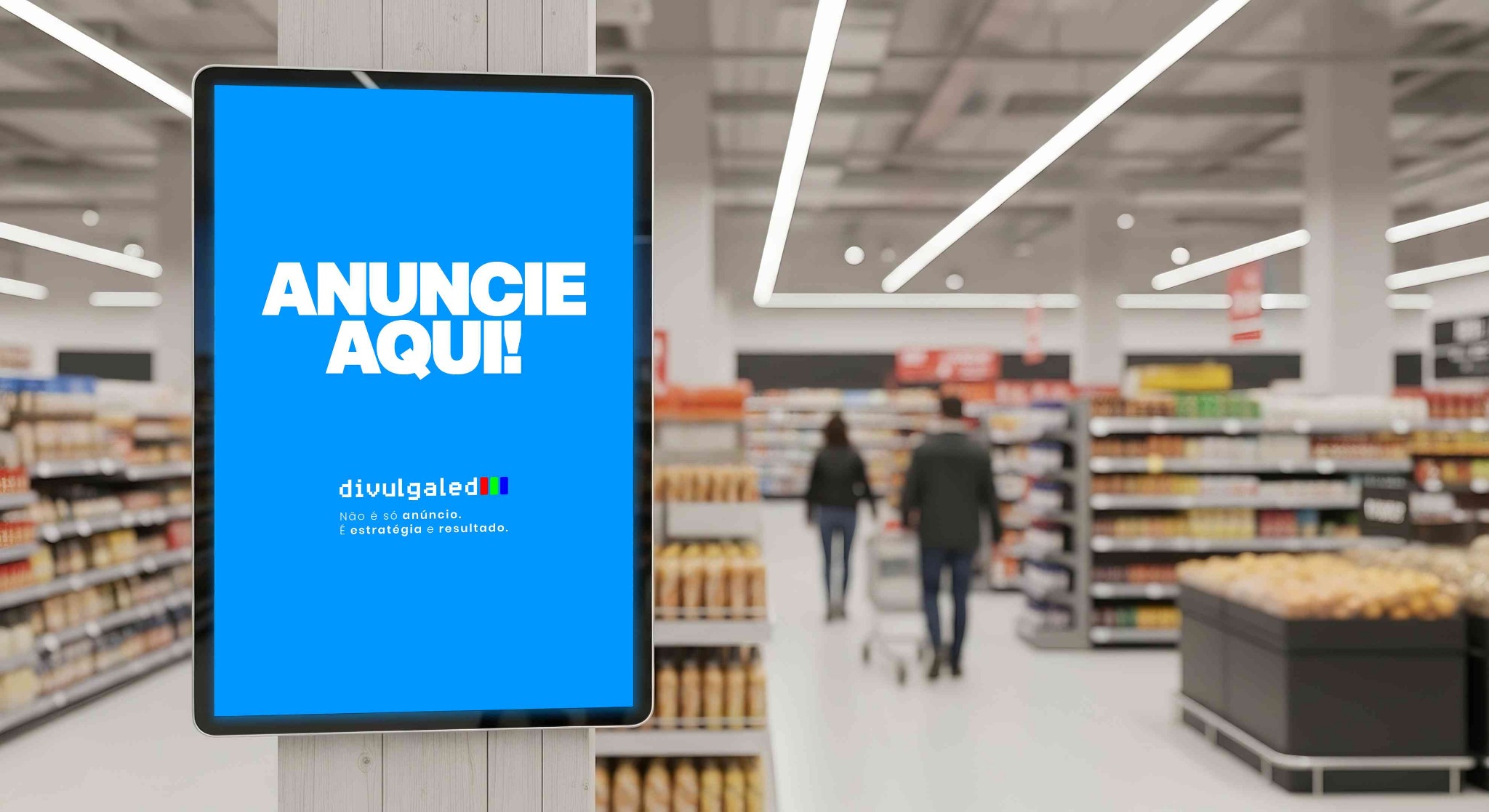 Tela vertical da Divulgaled em supermercado com a mensagem Anuncie aqui